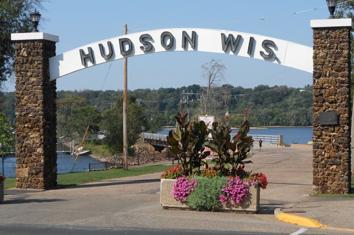 Archway over road reading Hudson Wis.